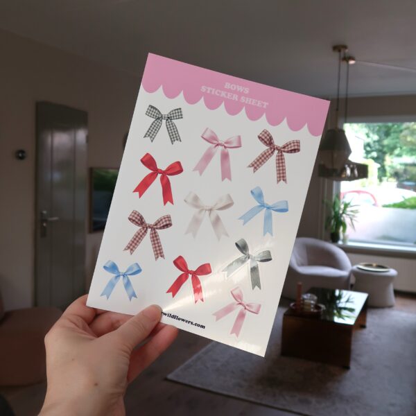 Stickervel met afbeeldingen van verschillende gekleurde strikjes.