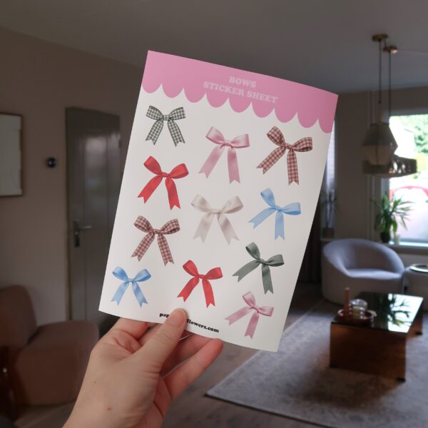 Stickervel met afbeeldingen van verschillende gekleurde strikjes.