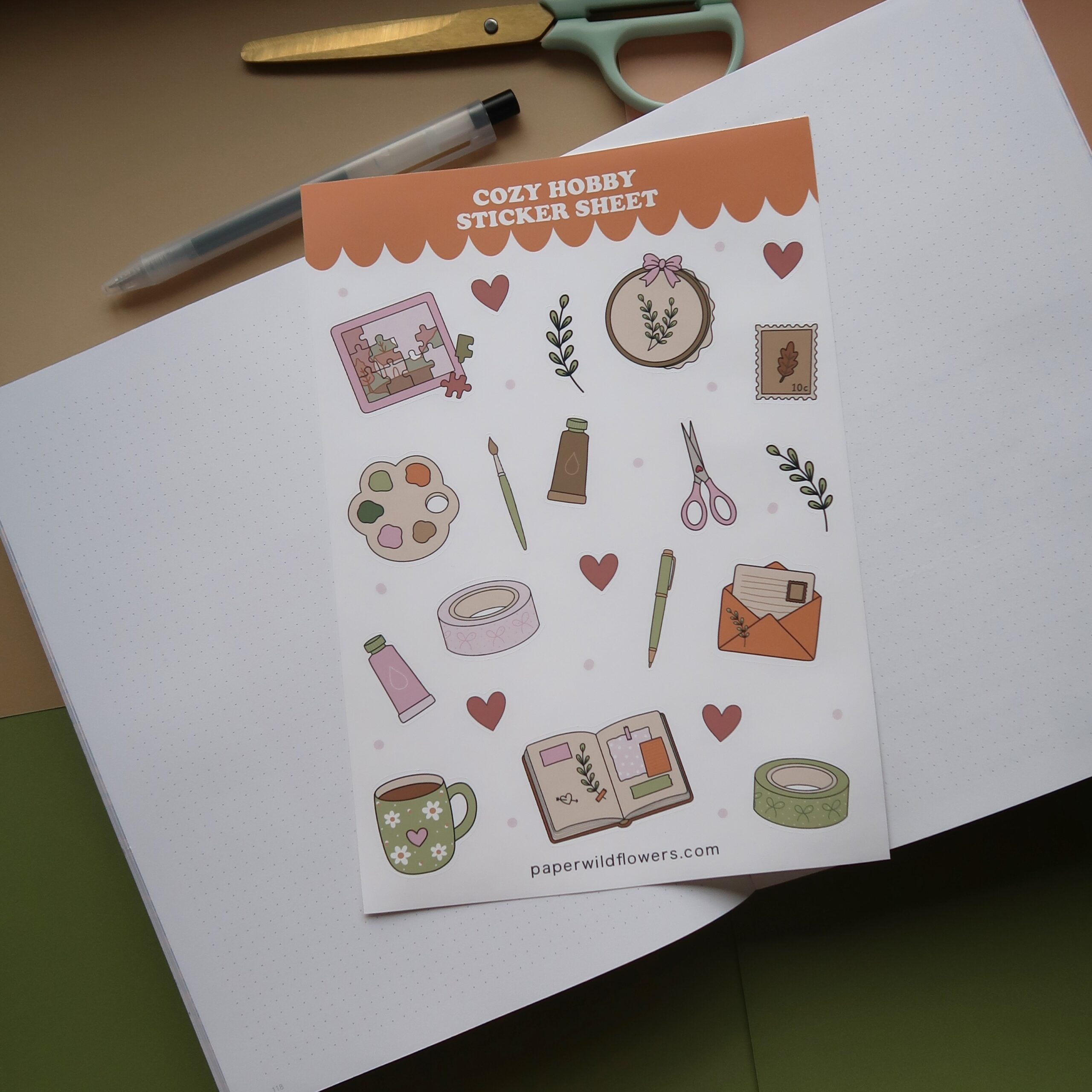 Afbeelding van stickervel met illustraties van cozy hobby's.